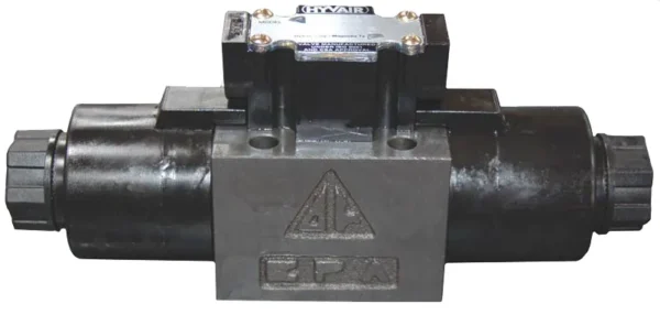 A black and silver valve with a gray label