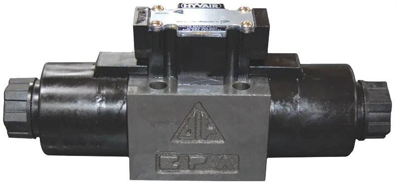 A black and silver valve with a gray label