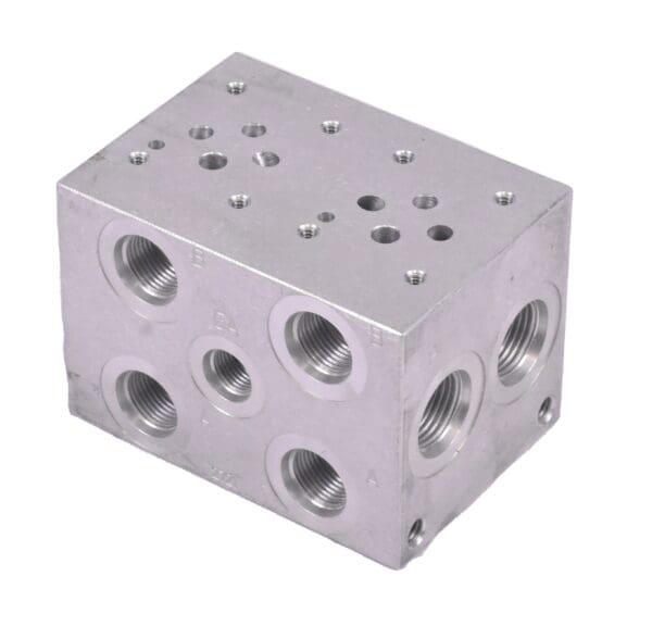 A block of metal with holes for the bottom.