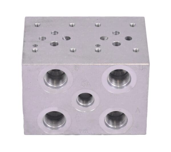 A silver block with holes for the front of it.