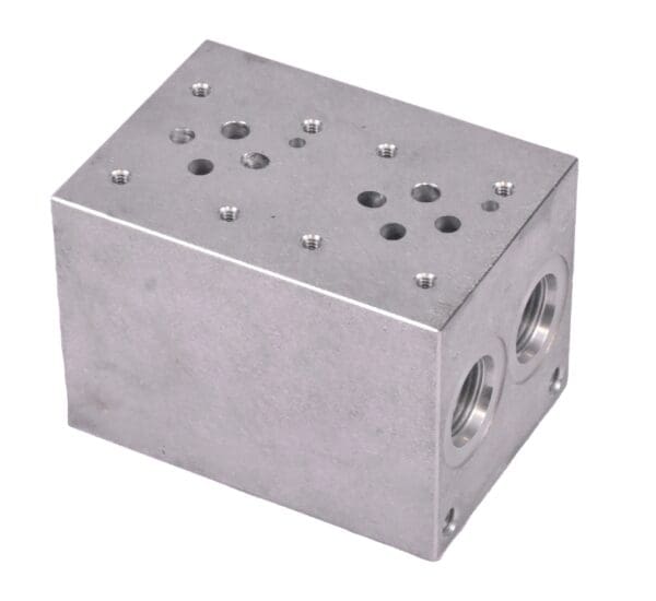 A metal box with holes for the valves.