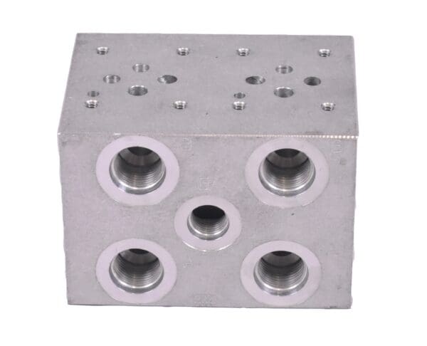 A block of four holes with five different sizes.