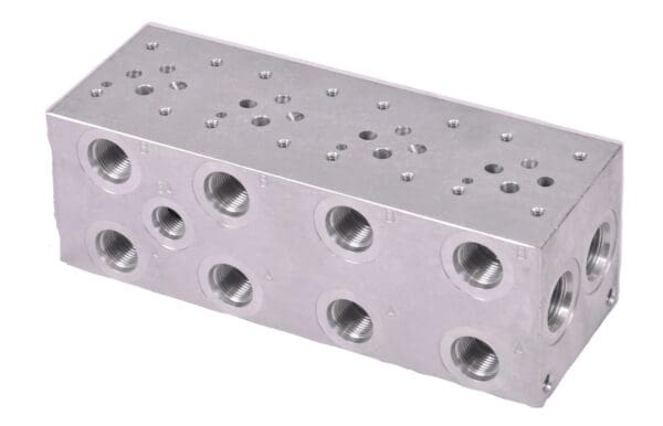 A block of metal with holes for the front and back.