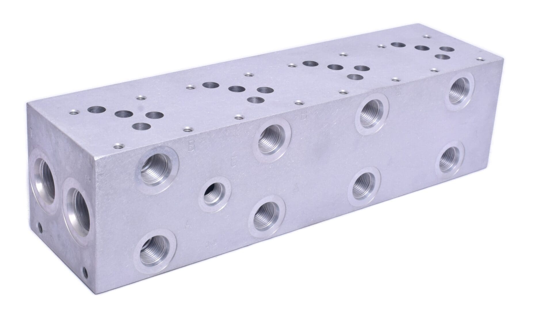 A block of aluminum with holes for the bottom.