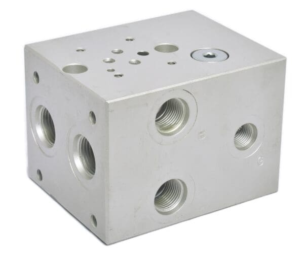 A silver block with holes for the front of it.