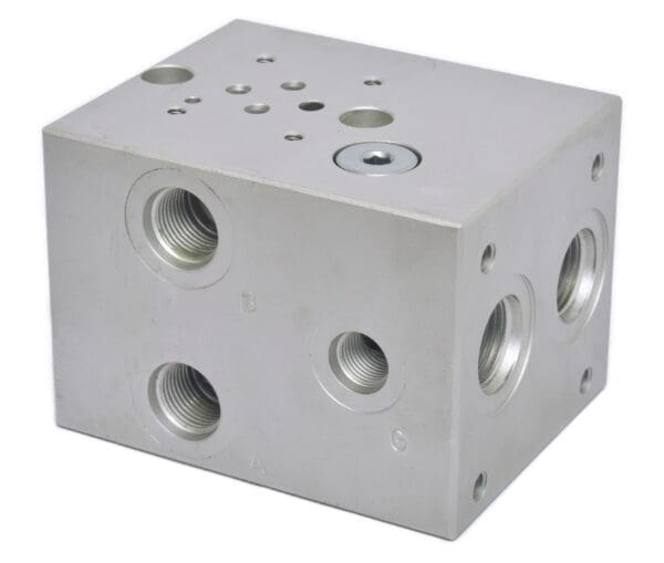 A block of metal with holes for the top.