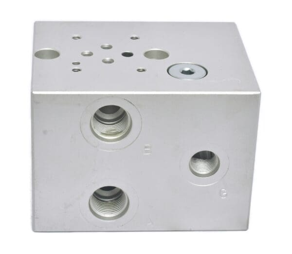 A silver cube with holes for the sides.